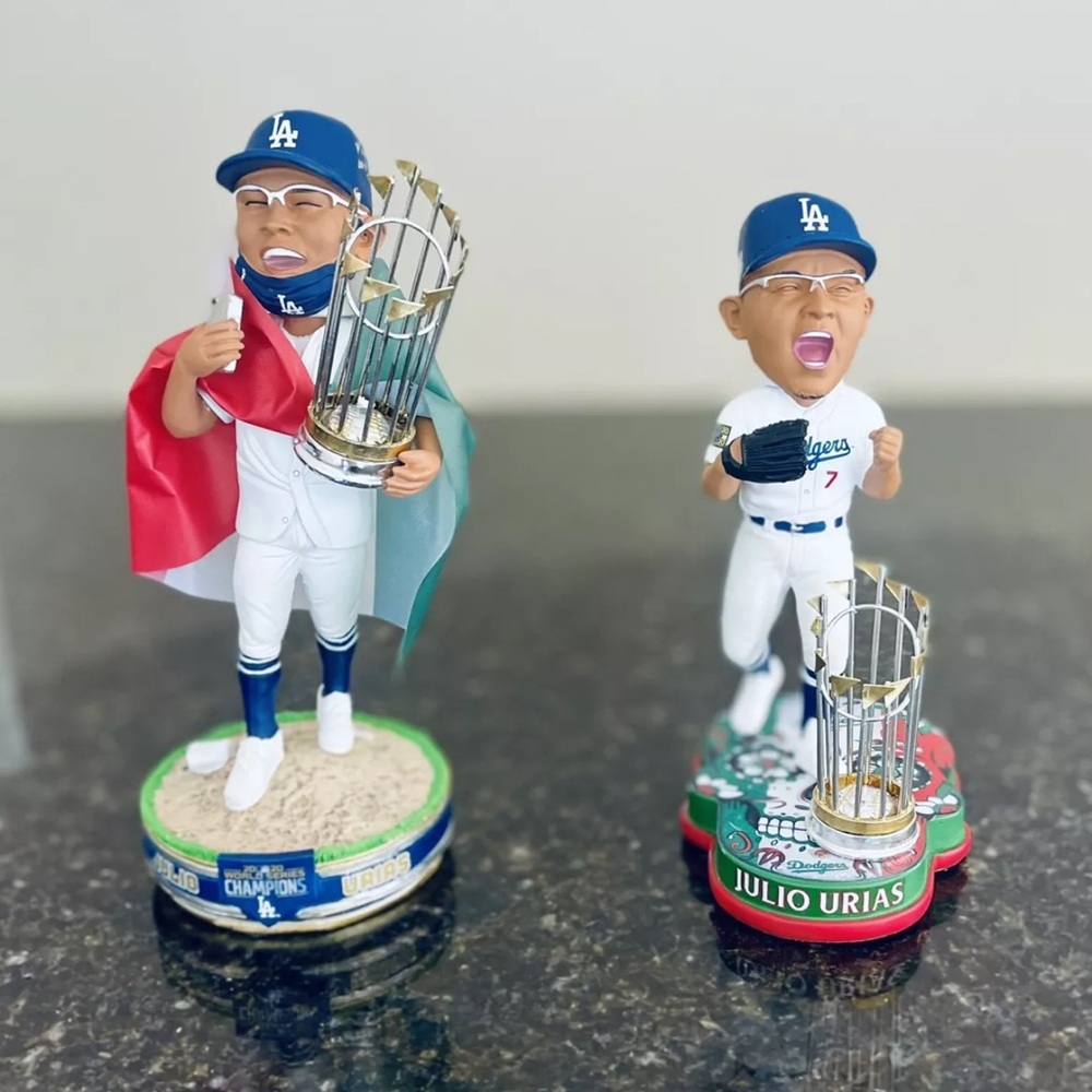 this bundle a Julio Urias 2020 World Series
FOCO Flag and a Last Out Bobblehead.
